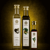 Three bottles of Kaizer oils (coconut oil, Avocado oil, Malkangani Oil)  on a gradient background