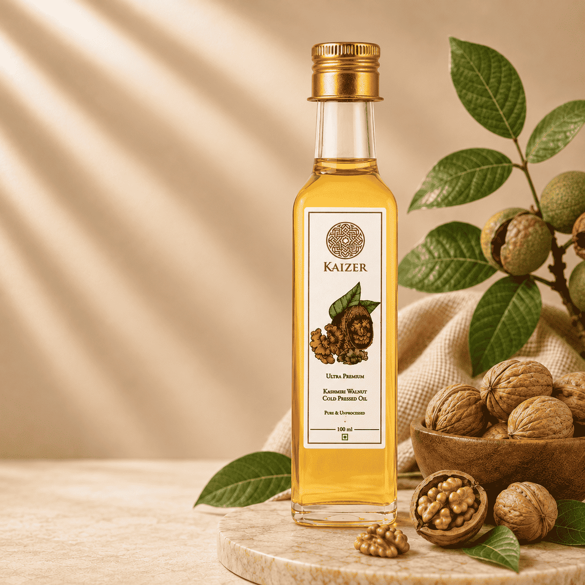 A bottle of Kashmiri Walnut Oil with a bowl of walnuts. The oil appears clear and is displayed against a warm background.