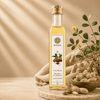 A bottle of Kaizer Red Peanut Oil with a label showing the brand name and a bowl of peanuts. The oil is presented as a clear liquid inside the bottle.
