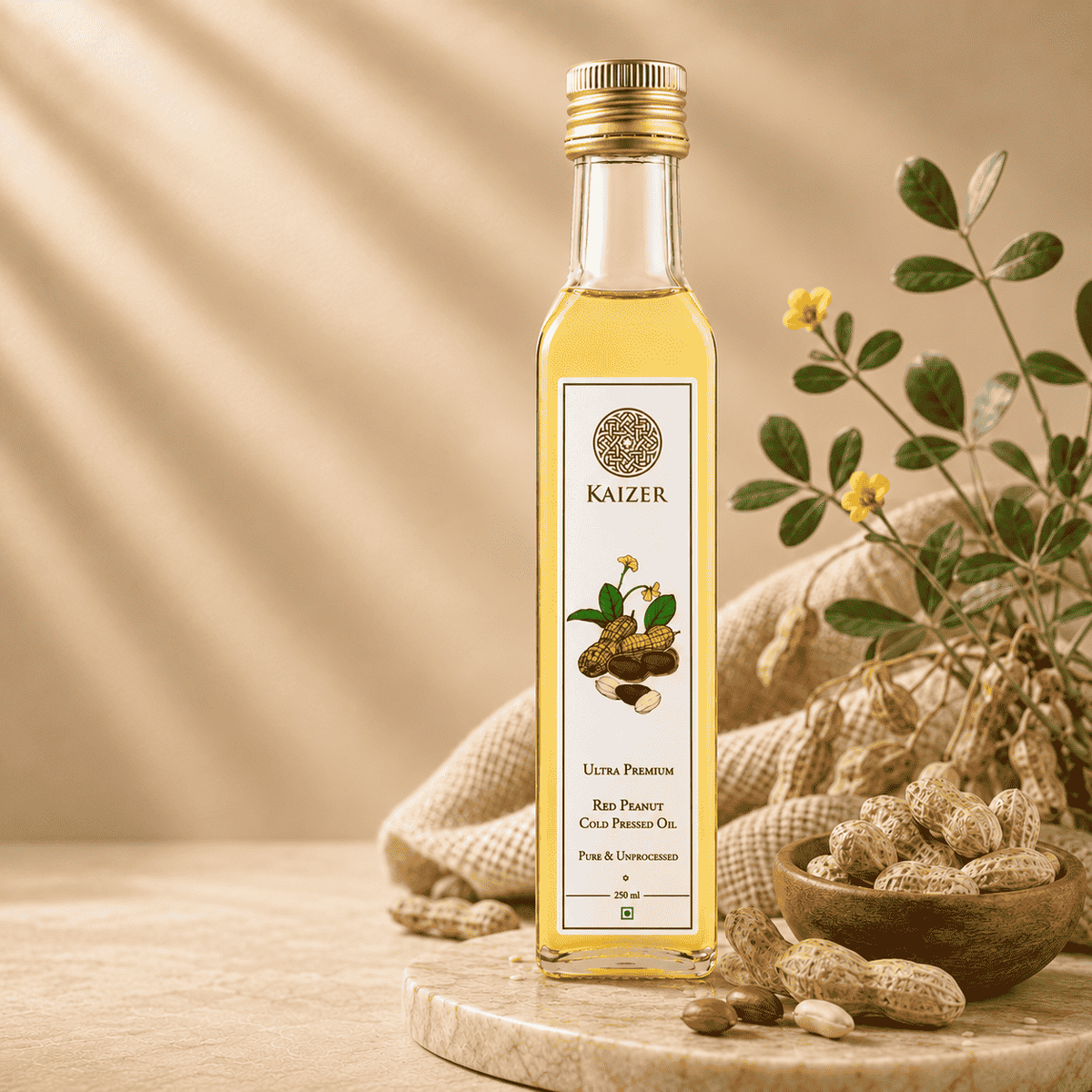 A bottle of Kaizer Red Peanut Oil with a label showing the brand name and a bowl of peanuts. The oil is presented as a clear liquid inside the bottle.