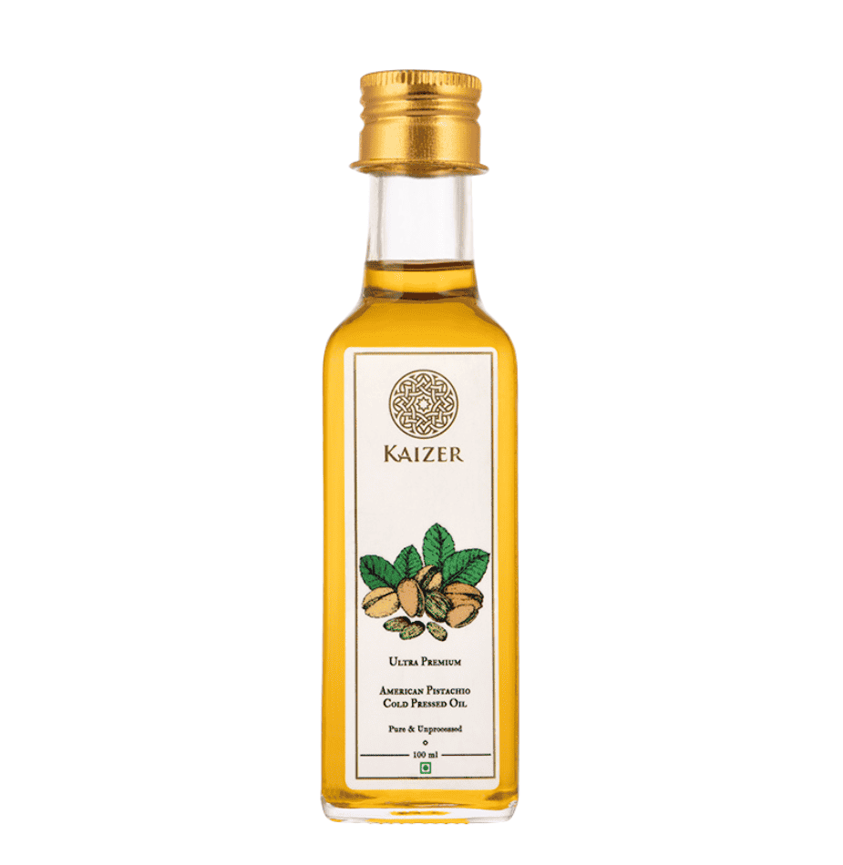 A bottle of American Pistachio Oil with a label showing the product name and an image of pistachios. The background is transparent.
